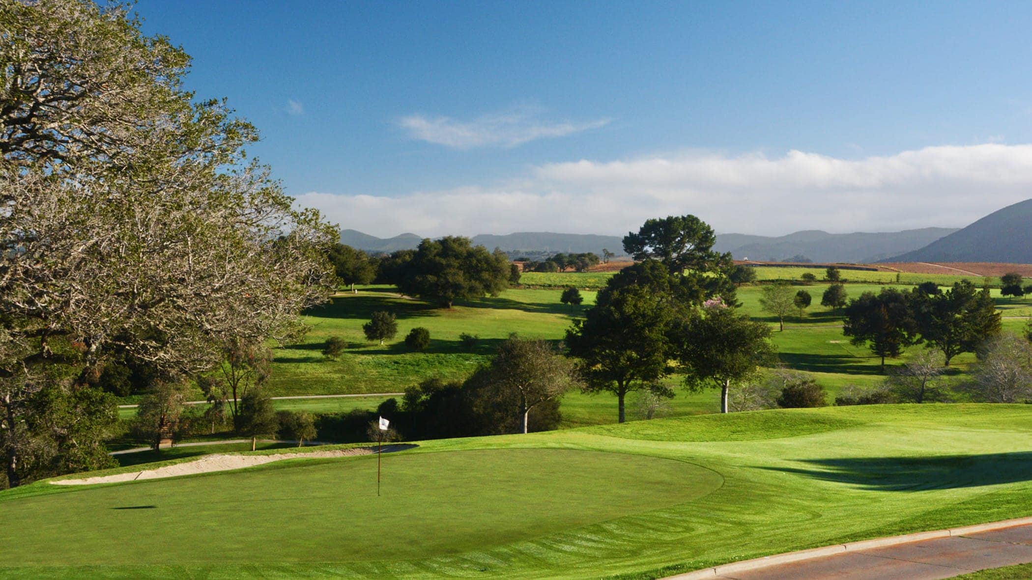 Golf course with a rich green turf beautiful scenery at The club at crazy horse ranch in Salinas, California.